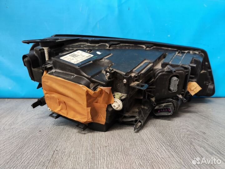 Фара левая Volkswagen Touareg 2 2010-2018