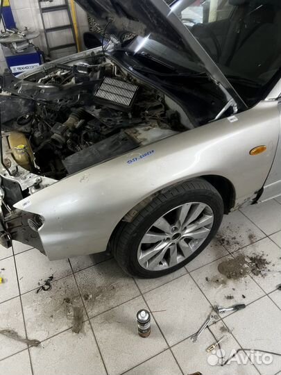Крыло левое mazda millenia 1998