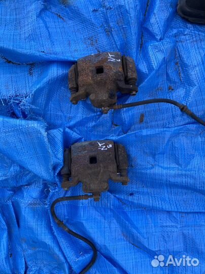 Nissan Teana J32 суппорт тормозной