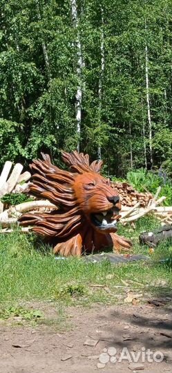 Лев из цельного корня дерева