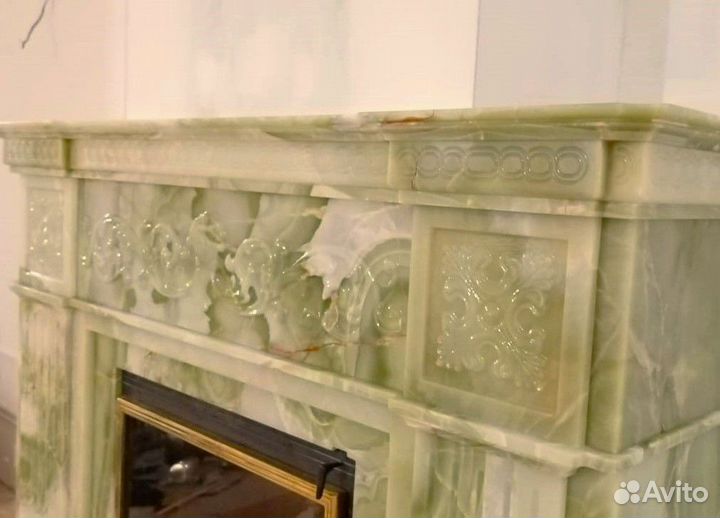 Камин с рельефной резьбой