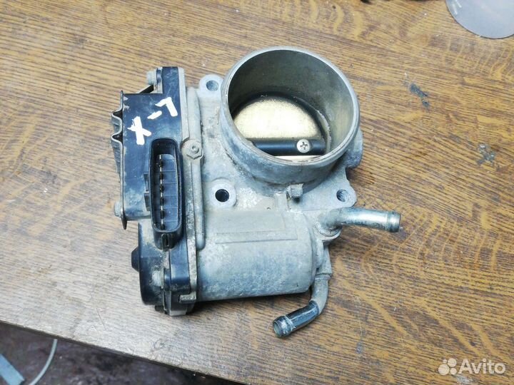 Дроссельная заслонка Митсубиси Лансер 10