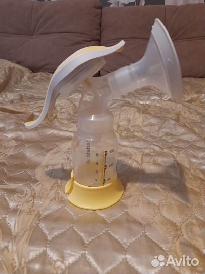 Молокоотсос medela ручной