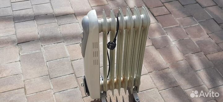 Электричесский масляный обогреватель