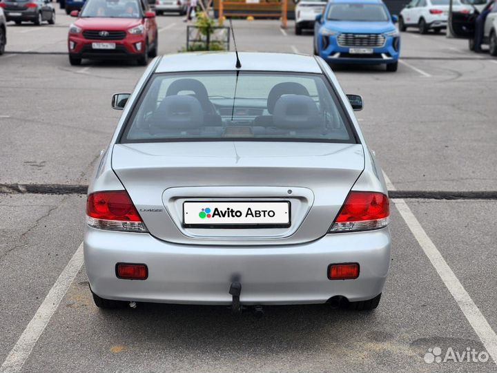 Mitsubishi Lancer 1.6 МТ, 2006, 310 000 км