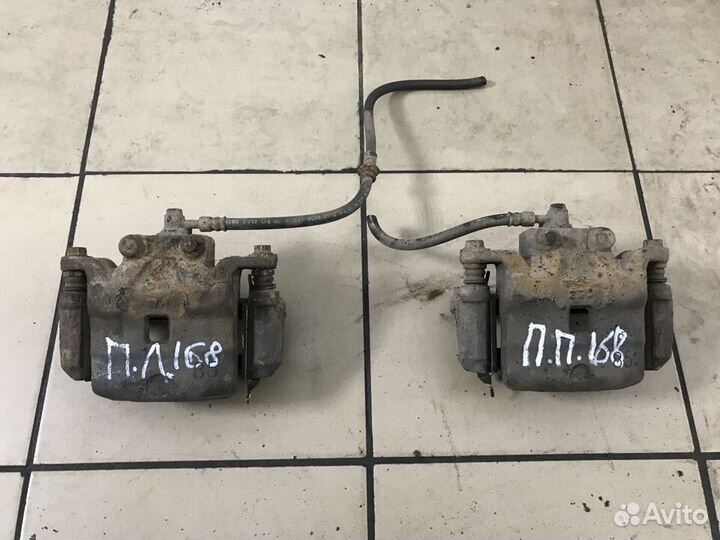 Суппорт тормозной Nissan Teana J32