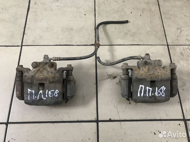 Суппорт тормозной Nissan Teana J32