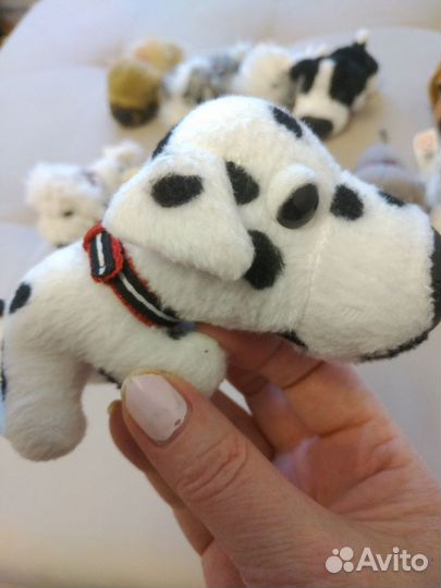 Коллекция игрушек собак