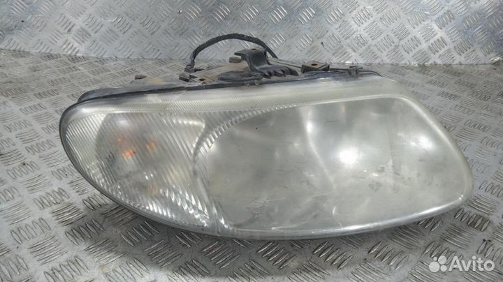 Фара 04857702AB Chrysler Voyager (2001-2007)