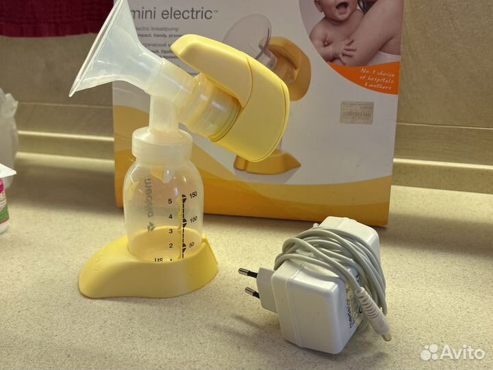 Молокоотсос medela электрический
