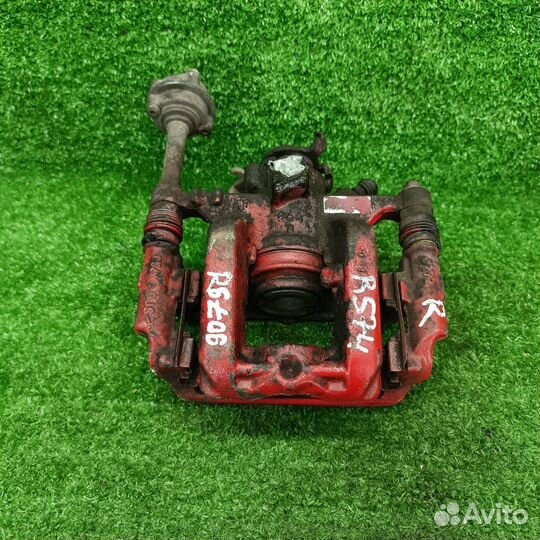 Суппорт тормозной задний правый Opel Astra J GTC