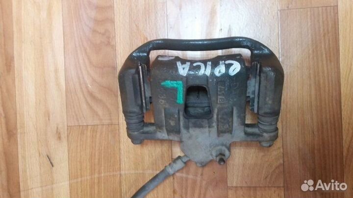 Суппорт тормозной задний левый Chevrolet Epica I