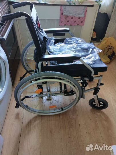 Инвалидная коляска новая