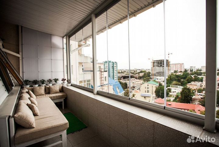 Безрамное раздвижное остекление