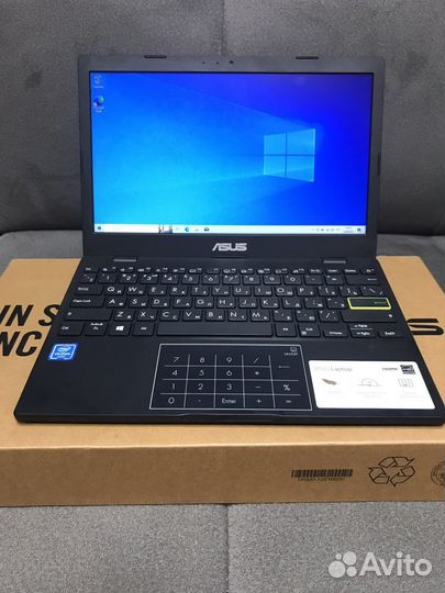 Asus R214M