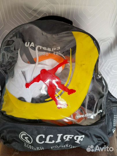 Роликовые коньки