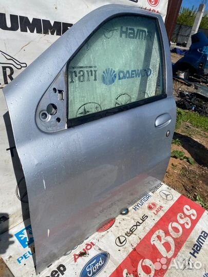 Дверь передняя левая Fiat Albea седан 80CV/59KW