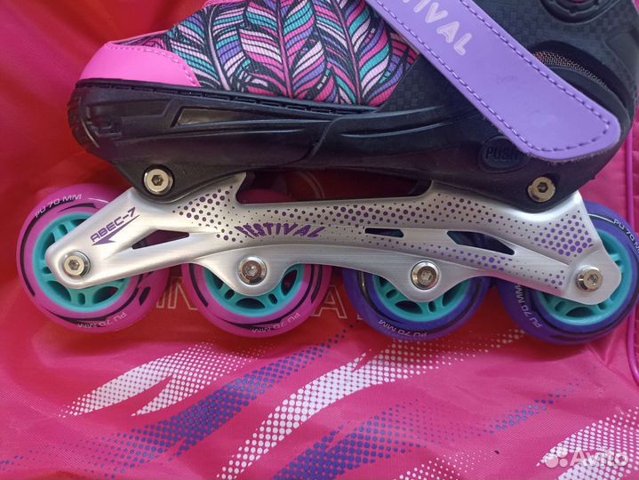 Роликовые коньки