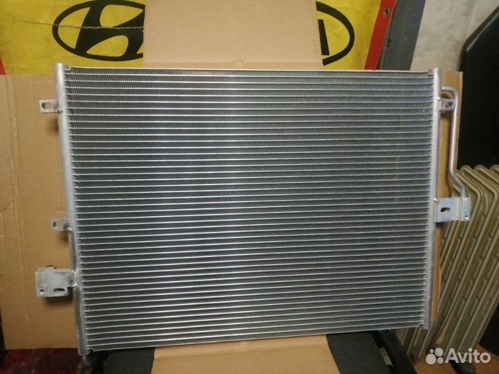 Радиатор кондиционера Ssang Yong Kyron