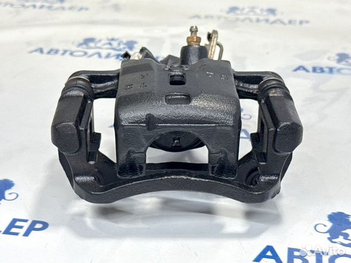 Суппорт задний правый Nissan Primera P12 QG18DE