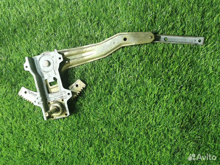 Стеклоподъемник З.П. NIssan Almera Classic I