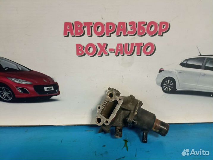 Корпус термостата Renault Logan 1