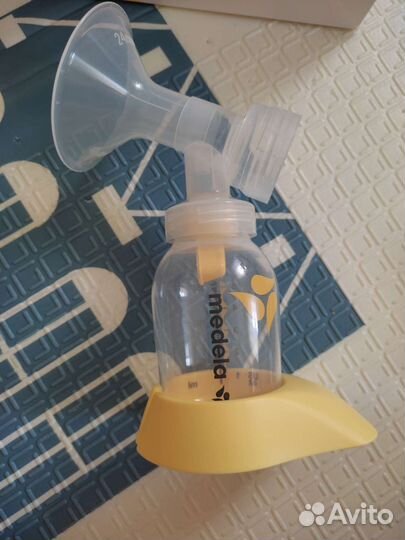 Молокоотсос medela mini электрический