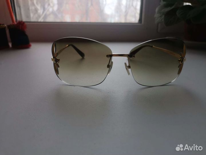 Солнцезащитные очки женские брендовые