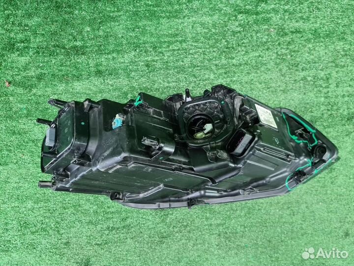 Фара левая Volkswagen Touareg