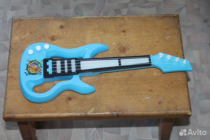 Детская электрогитара (игрушка)