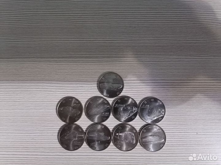 Монеты Японии поезда