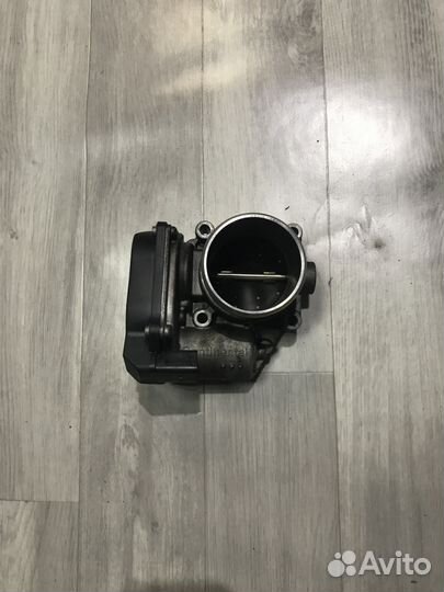 Дроссельная заслонка Ауди Пассат Шкода. 06F133062Q