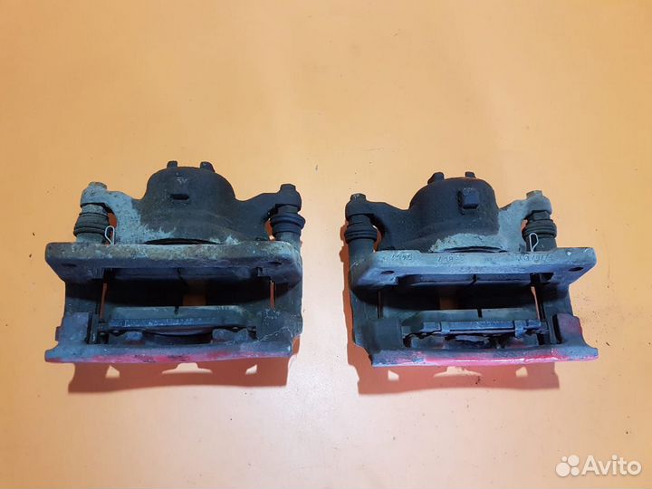 Суппорт тормозной передний на Honda Civic 5D