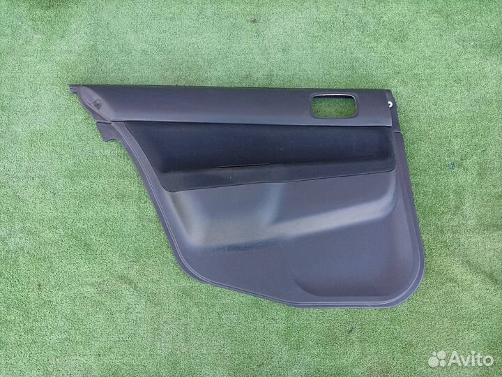 Обшивка двери задняя левая Mitsubishi Lancer 9