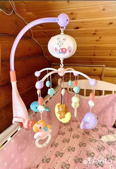 Музыкальный мобиль в кроватку