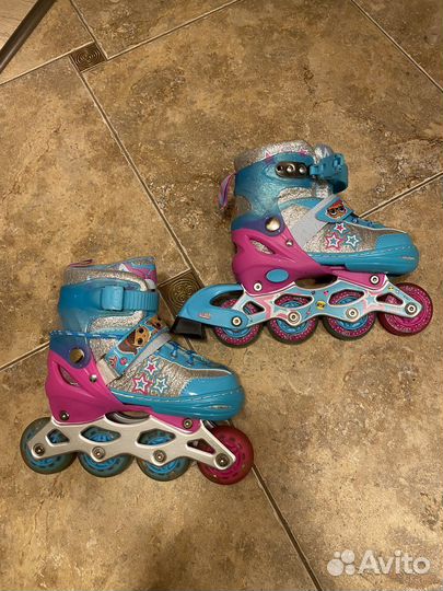 Роликовые коньки