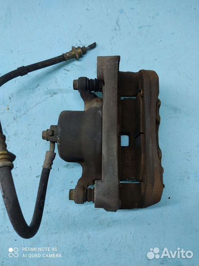 Суппорт передний левый Nissan Teana j31