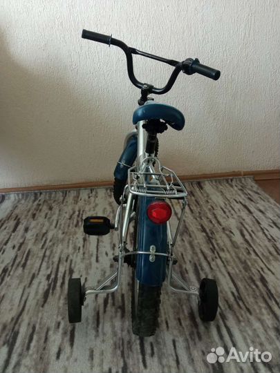 Четырехколесный велосипед