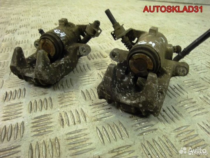 Суппорт тормозной задний VW Golf 4 6R0615423