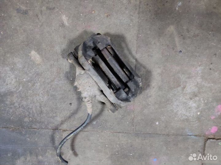 Суппорт тормозной передний левый Peugeot 206