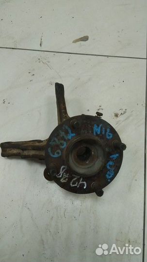 Кулак поворотный левый Nissan Almera