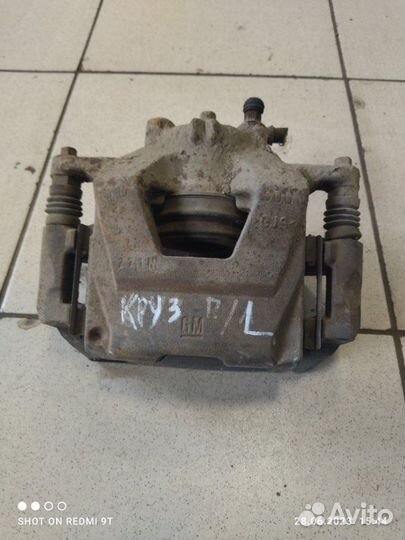 Суппорт тормозной передний левый Chevrolet Cruze