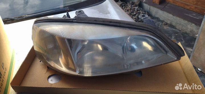 Фара передняя наOpel Astra G