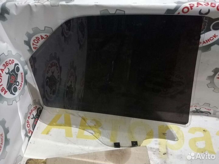 Стекло задней левой двери Renault Logan 1