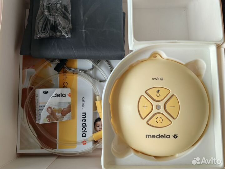 Молокоотсос medela электрический