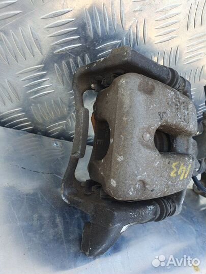 Суппорт задний Volkswagen Touran 2006-2010