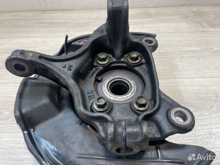 Кулак поворотный передний левый Mazda 3 BM