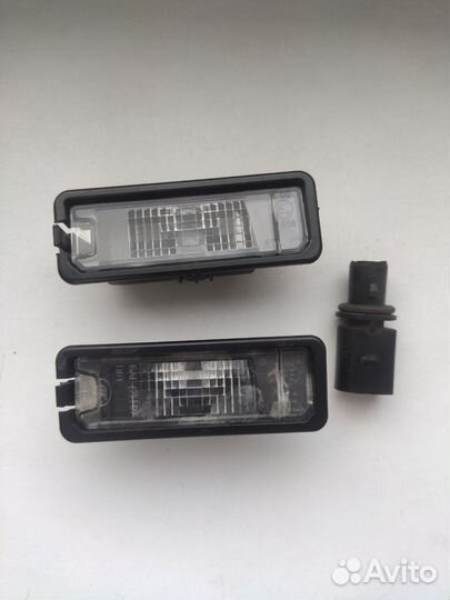Фонарь подсветки заднего номера 1K8943021