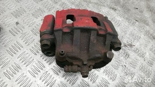 Суппорт тормозной передний левый mazda CX-7 1 (DEA