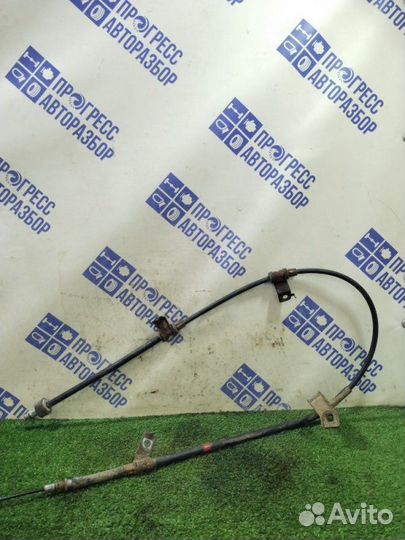 Трос ручника левый Kia Rio 2 хэтчбек 1.4 G4EE 2009